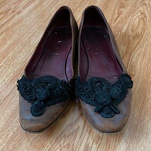 Vintage Prada flats with embroidery detail
